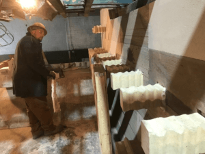 A Schad refractory contractor inspects an aluminum reverb furnace in North Carolina.