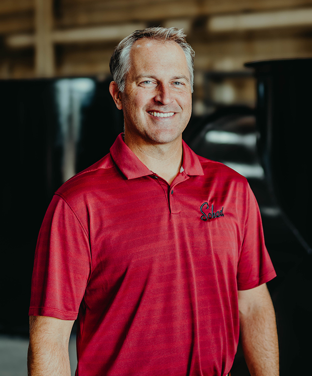 Schad_Headshot_NameHere 11